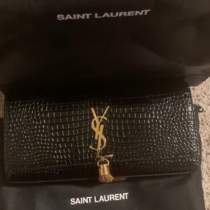 Yves Saint Laurent Clutch. Only used it once.